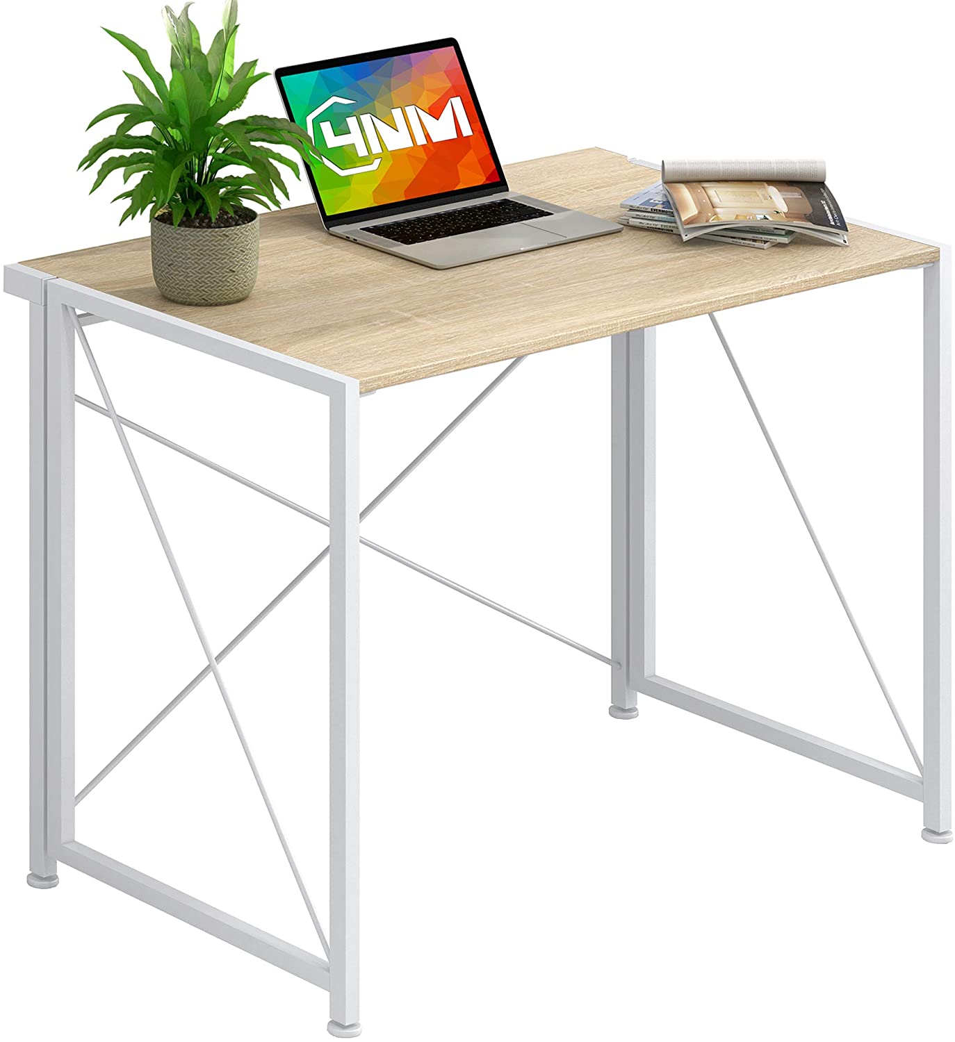 foldable office table with a laptop and a plant