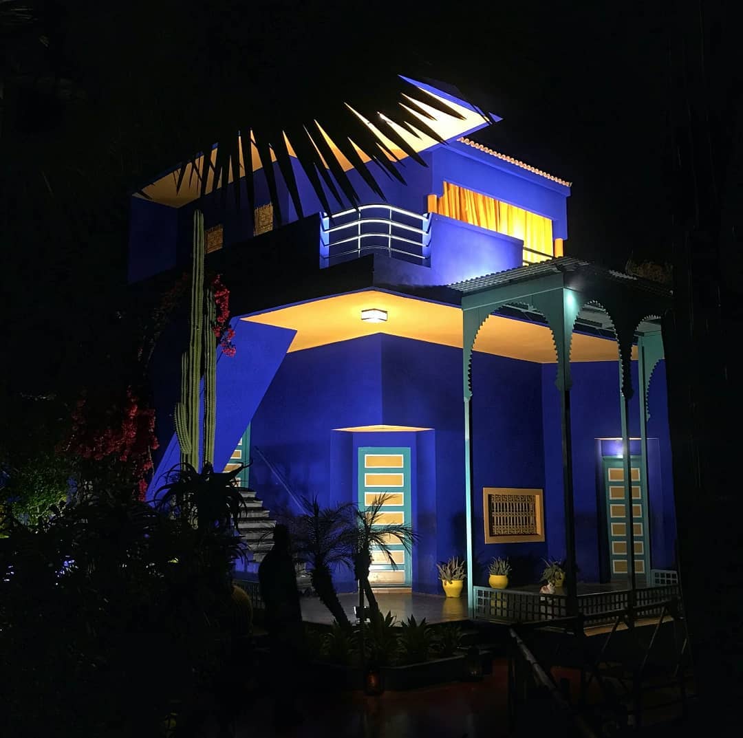 a night time photography shot of Jardin Majorelle Morocco building