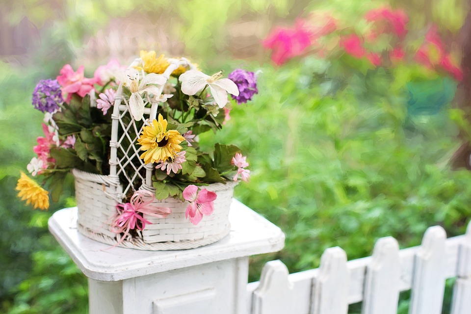 horizontal flower arrangement in a basket
