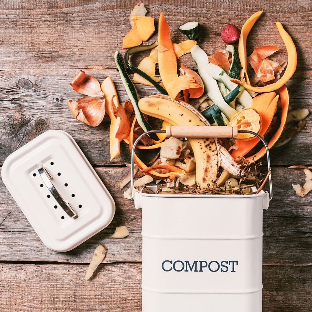 compost bucket with sawdust and compost